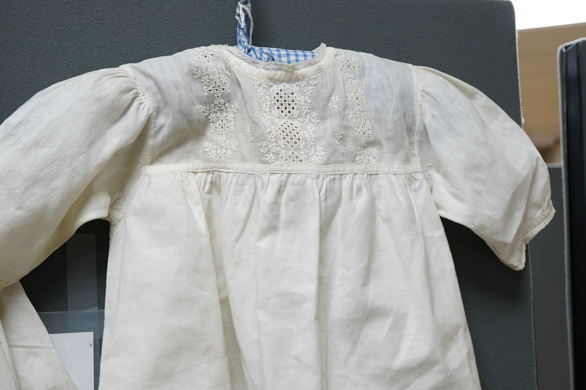 Three 20th century baby’s cotton and machine lace night-dresses
